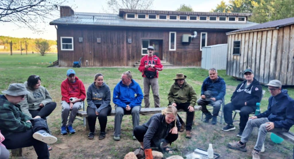 Sitting around the campfire at Boundless Camp